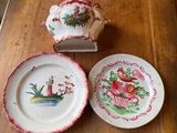 three plates and a bowl on a wooden table