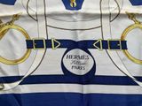 a scarf with a picture of a sailor ' s uniform on it