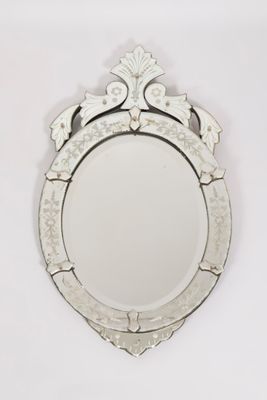 a mirror that is hanging on the wall in the room