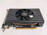 a close up of a video card with a fan on top of it
