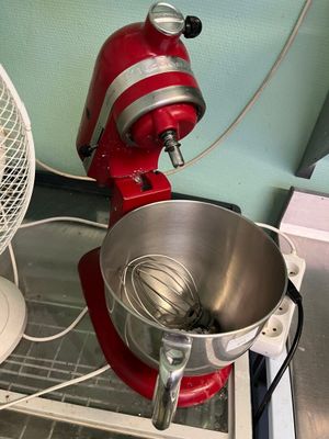 an image of a red mixer and a silver bowl