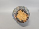 a close up of a ceramic object on a table
