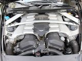 the engine of a car with its hood open and the hood down