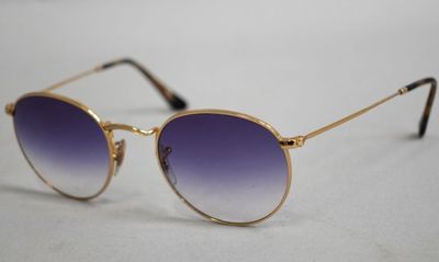 RAY BAN Paire de lunettes de vue et solaire