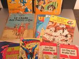 many children ' s books that are on a table