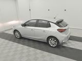 a picture of a white car in a garage