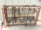 a shelf with a bunch of tools on top of it