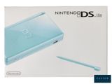 the nintendo ds lite is in the box with a pen