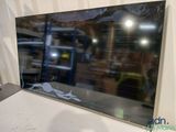 a picture of a flat screen tv sitting on top of a counter