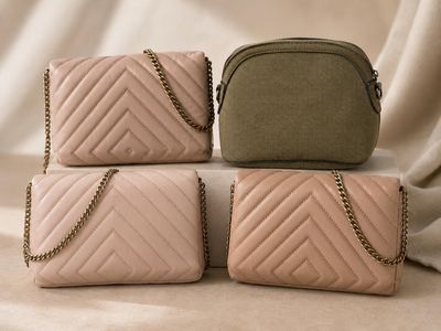 three pink and green bags sitting on top of each other