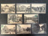 several old black and white photographs of a city street