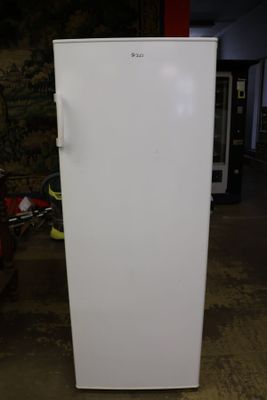 a white refrigerator in a garage with a bike in the background