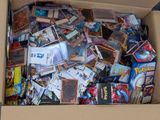 a cardboard box filled with many different types of cards