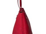 a red handbag on a white background with a white background