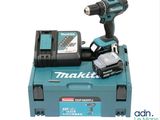 a close up of a cordless drill and battery in a case