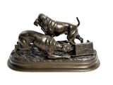 statue of a dog and a cat on a box on a white background