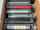 a box full of cassettes that are sitting on a table