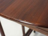 a close up of a wooden table with a white background