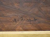 an image of a close up of a wooden table with writing on it