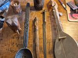 a wooden table topped with various items on it