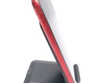 a cell phone that is sitting on a stand