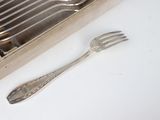 silverware in a wooden box with a fork and a spoon