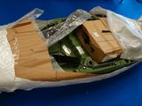 une image représentant un bateau en papier et en carton