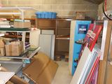 a room with a lot of boxes and boxes on the floor