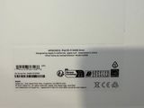 the back of a white box with a black and white label on it