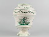 an image of a vase with a green and white design on it
