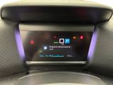 an image of a car dashboard with a digital display on it