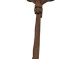 an old rusty spoon with a handle on a white background