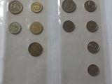 a lot of coins in a plastic bag on a table