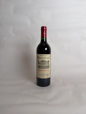a bottle of wine that is sitting on a table
