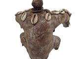 a statue of an elephant with a hat on it ' s head