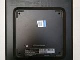 a black laptop with a sticker on the back of it