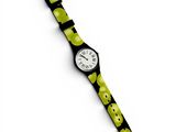 a black and yellow watch with green apples on it