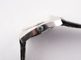 an image of a close up of a watch on a white surface