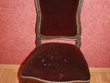 a chair that is sitting on a hard wood floor