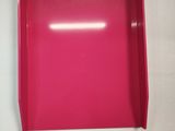 a pink box that is on a white table