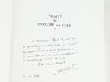 an open book with a handwritten letter on it