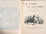 an open book with a picture of a castle on it