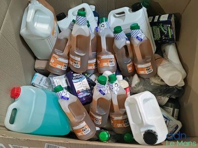 a cardboard box filled with lots of different types of beverages