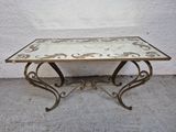 wrought iron coffee table with glass top and scroll design
