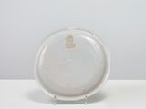an image of a white plate sitting on top of a table
