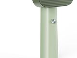 une image représentant un haut-parleur vert sur fond blanc
