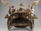 an image of a sculpture of a fish with wings on it ' s head