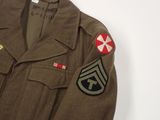 an image of a military jacket with patches on it
