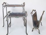 two chairs and a table with a chair on it