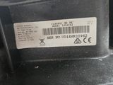 a close up of a car ' s rear bumper with a barcode on it